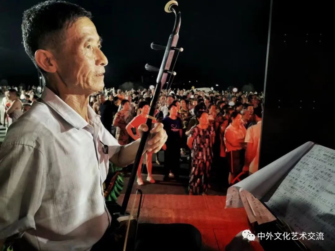 摄影协会会长刘国平镜头里的“舞动金溪，戏联中外”欢送晚会